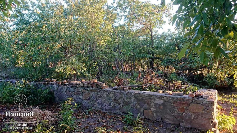 Півбудинку в Шамраівці.27 соток.Фундамент під новий будинок.