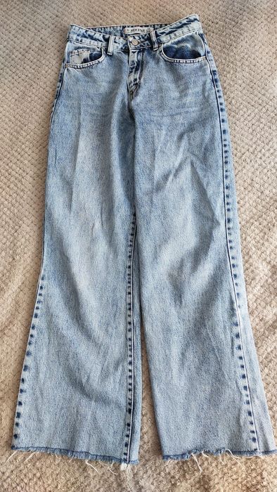 Широкі джинси жіночі