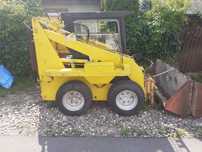 Unc-060 mini ladowarka coś jak bobcat