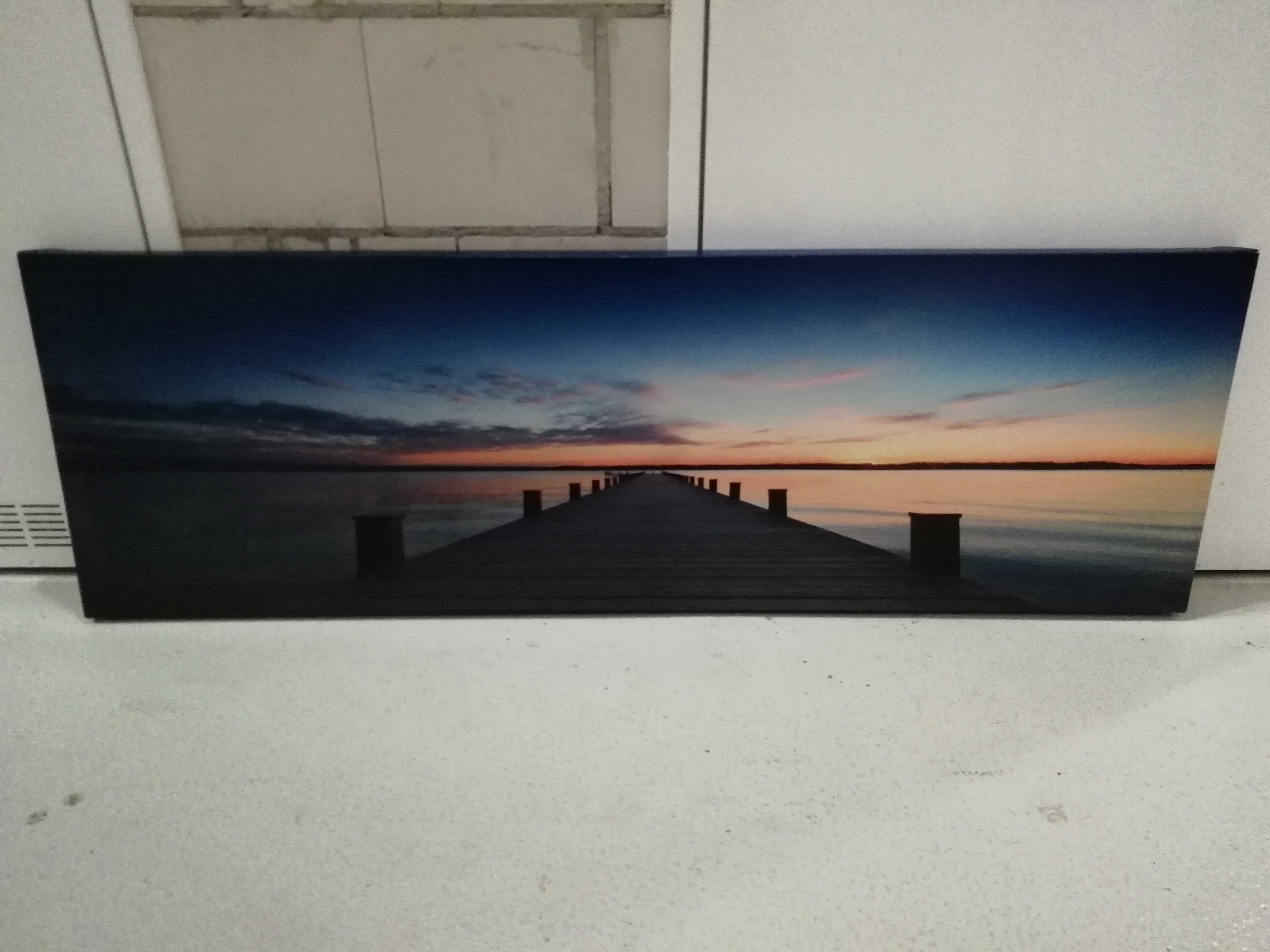 Obraz pomost nad jeziorem zachód słońca panorama 140x45