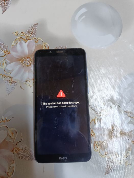 Телефон редмі 7 а