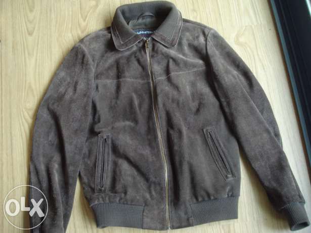 Casaco em pele com pouco uso