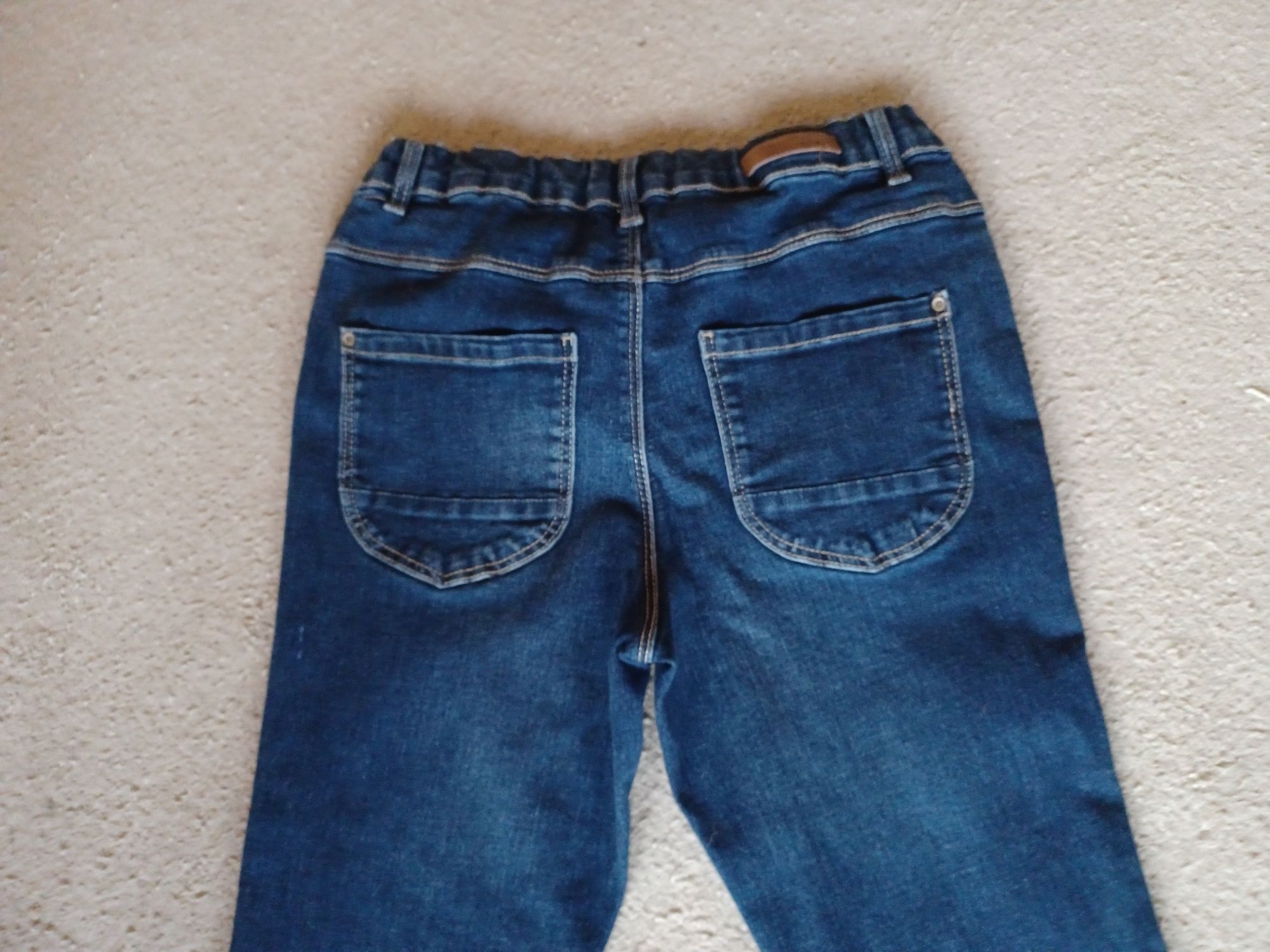 Spodnie jeansowe dla dziewczynki Name It r. 164