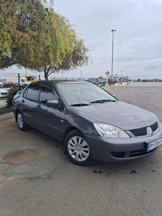 Продам Митсубиси Лансер