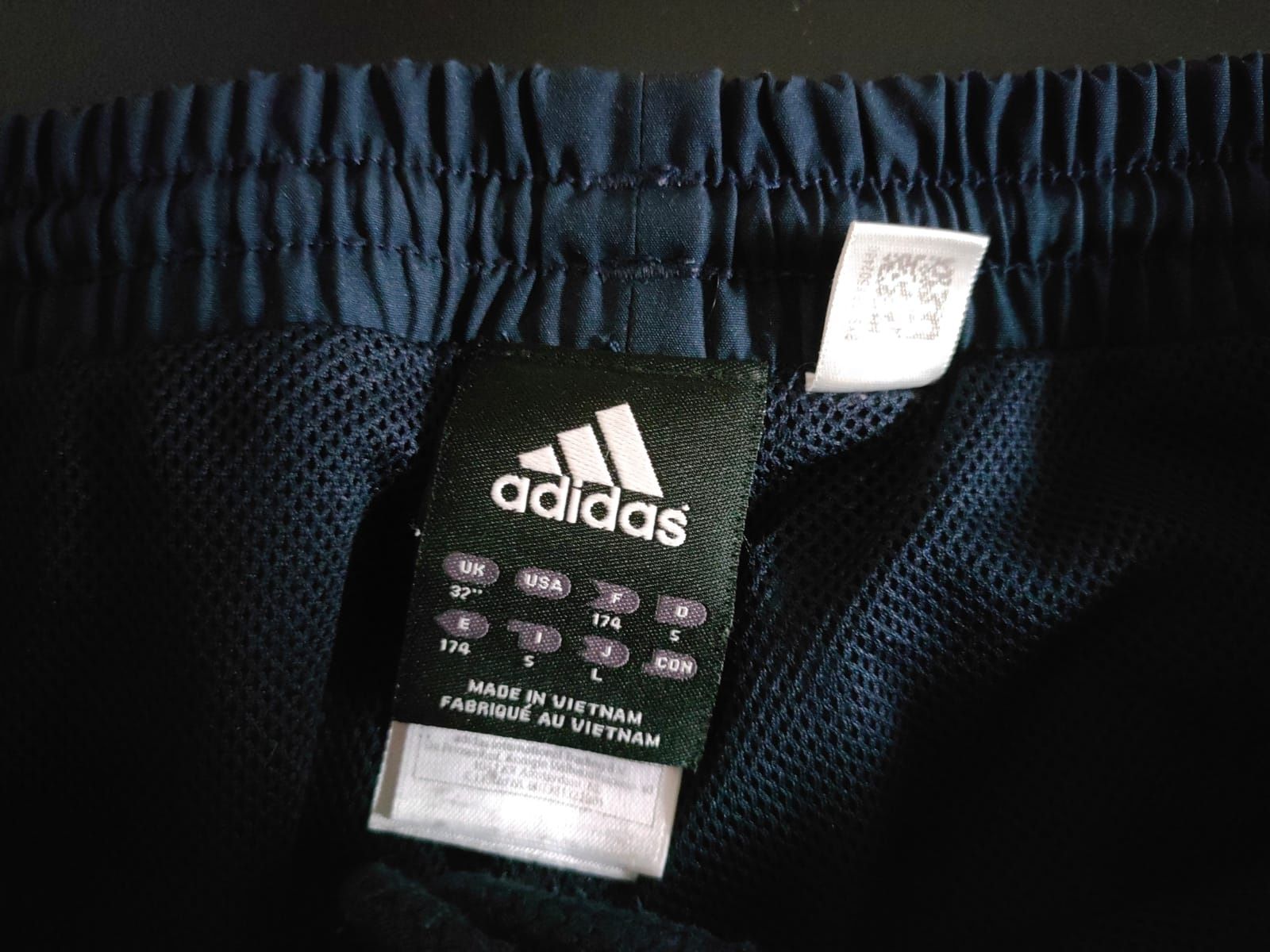 spodnie dresowe Adidas z podszewką i zamkami M/L