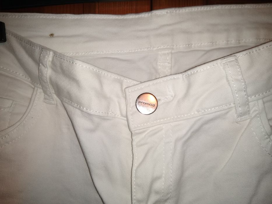 białe jeansy flared Promod rozmiar 40
