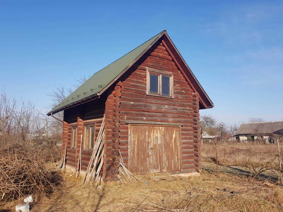 Будиночок зі зрубу та земельна ділянка 15 сот. с. Забужжя
