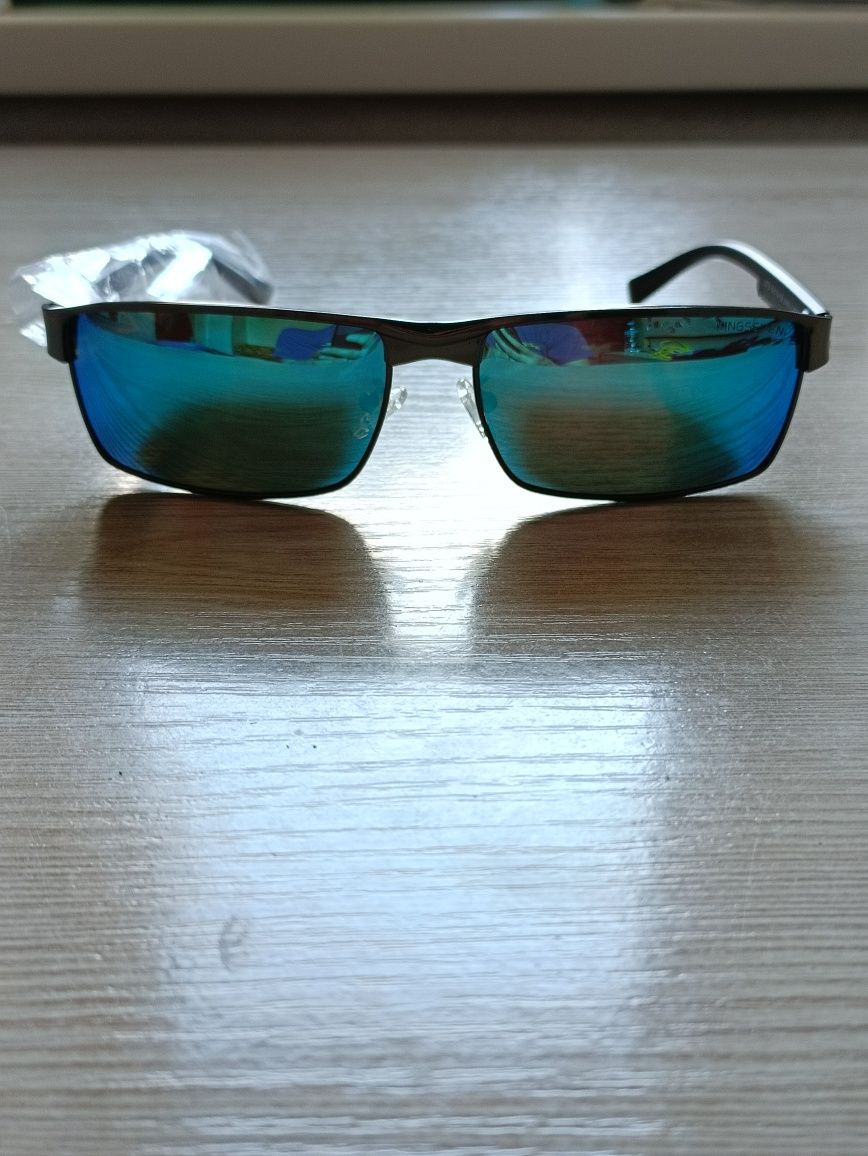 Сонцезахисні полярізаційні окуляри