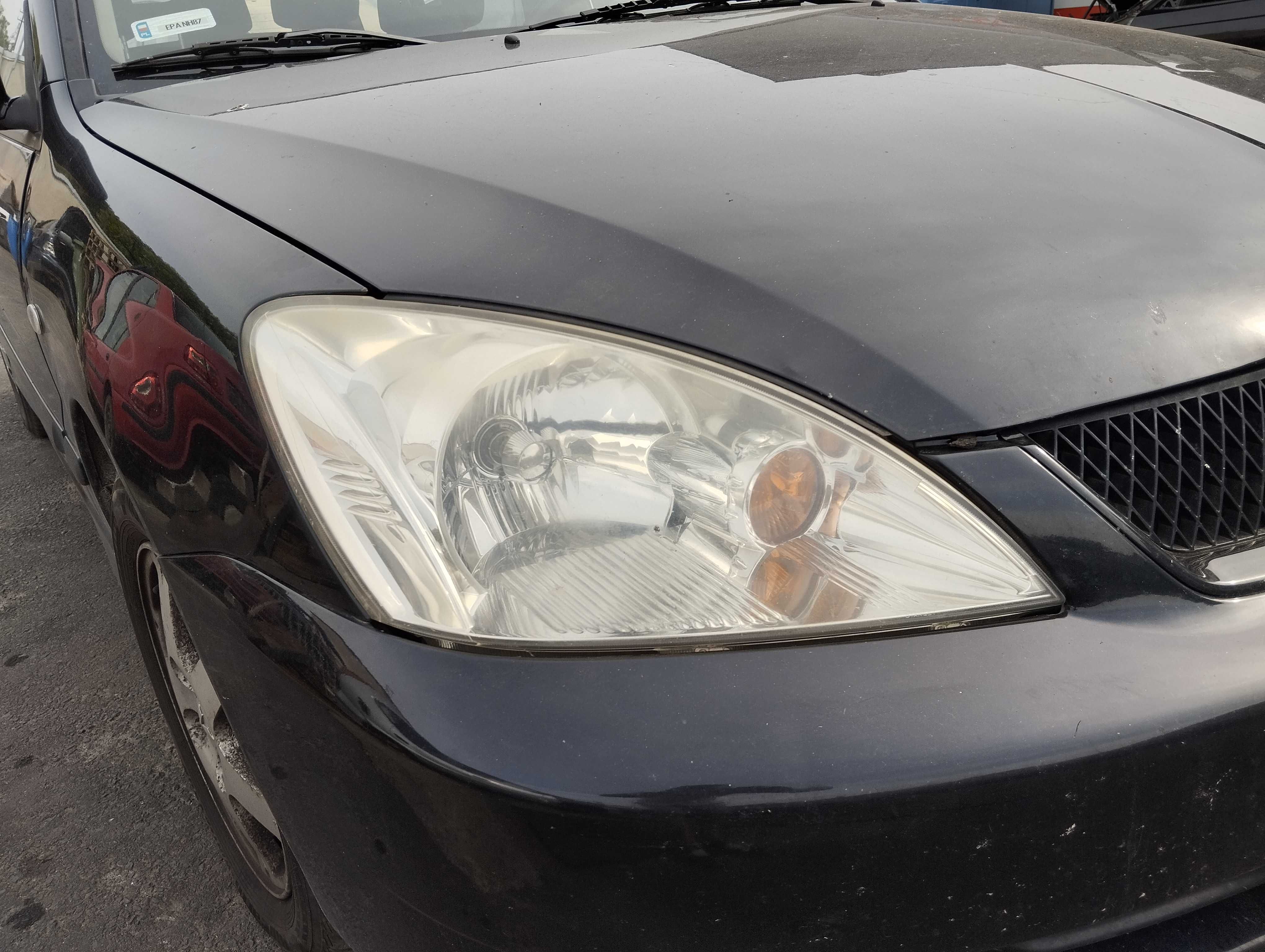 Mitsubishi Lancer Kombi 1.6i 2007r.Lampa przednia prawa.