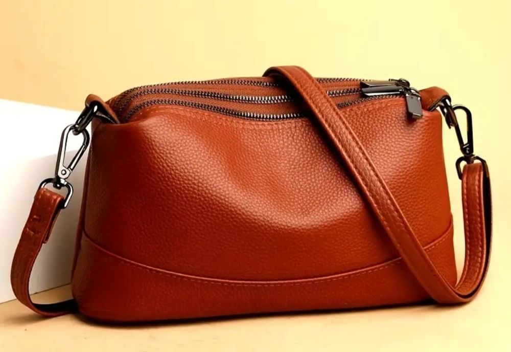Сумка з натуральної шкіри з трьома відділами