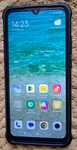 Smartfon Xiaomi Redmi A2 + ochronne ETUI + glass cover