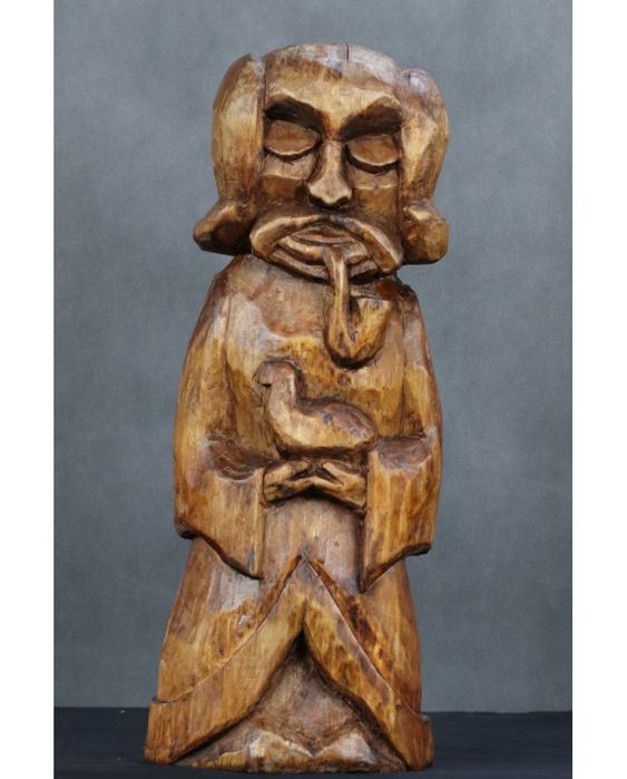 Postać z fajką. Drewno. Sztuka ludowa. Polska. XX wiek.