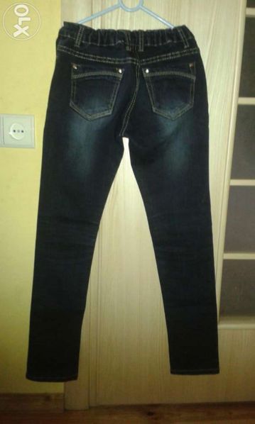 Spodnie jeansowe dziewczęce 146/152