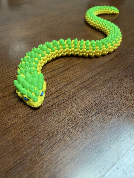 Brinquedo cobra articulada