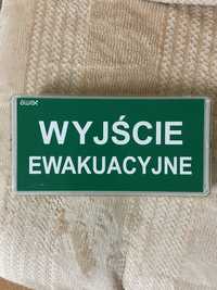 Znak wyjście ewakuacjne, oprawa awaryjna ewakuacjna, podświetlany