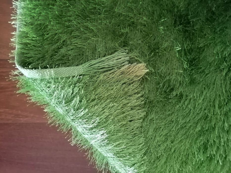 Tapete verde em algodão