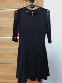 Sukienka czarna elegancka z prześwitująca siateczką 40