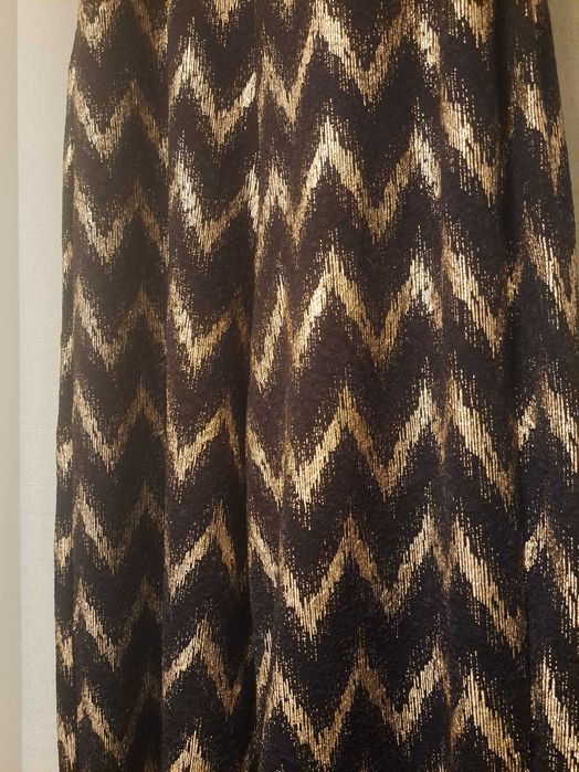 Macacão lefties com dourados