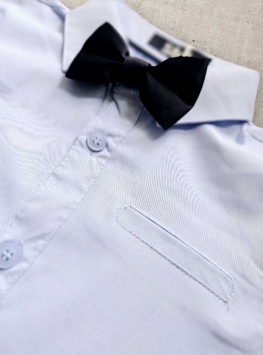 Niebieska koszula dla chłopca z muchą 7-8 lat