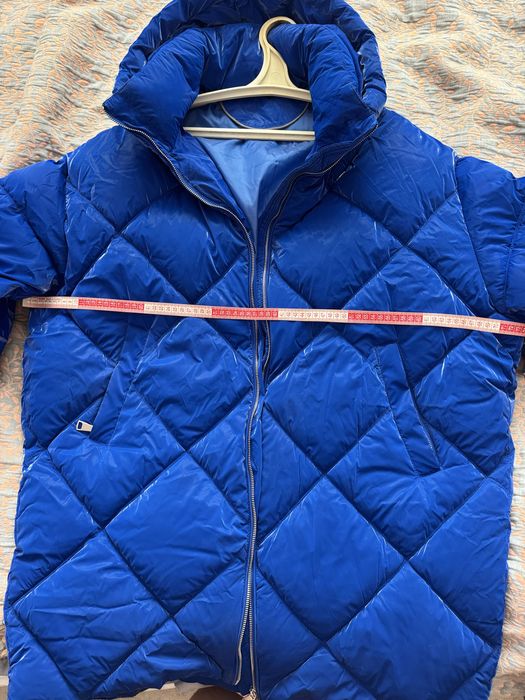 Подовжена зимова стьобана куртка пуховик