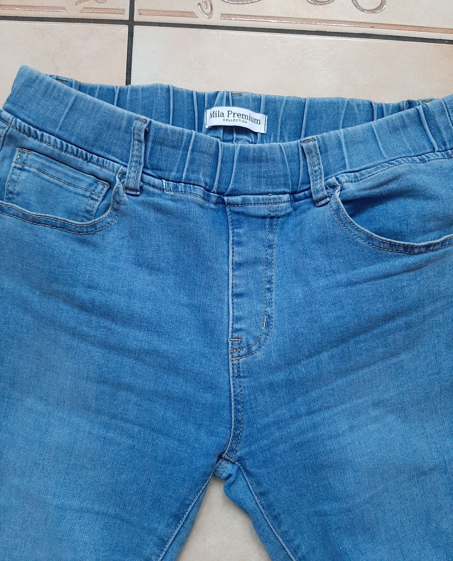 Niebieskie jeansy na gumce 40 skinni jasnoniebieskie rurki