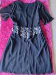 Vestido preto com detalhes em prata