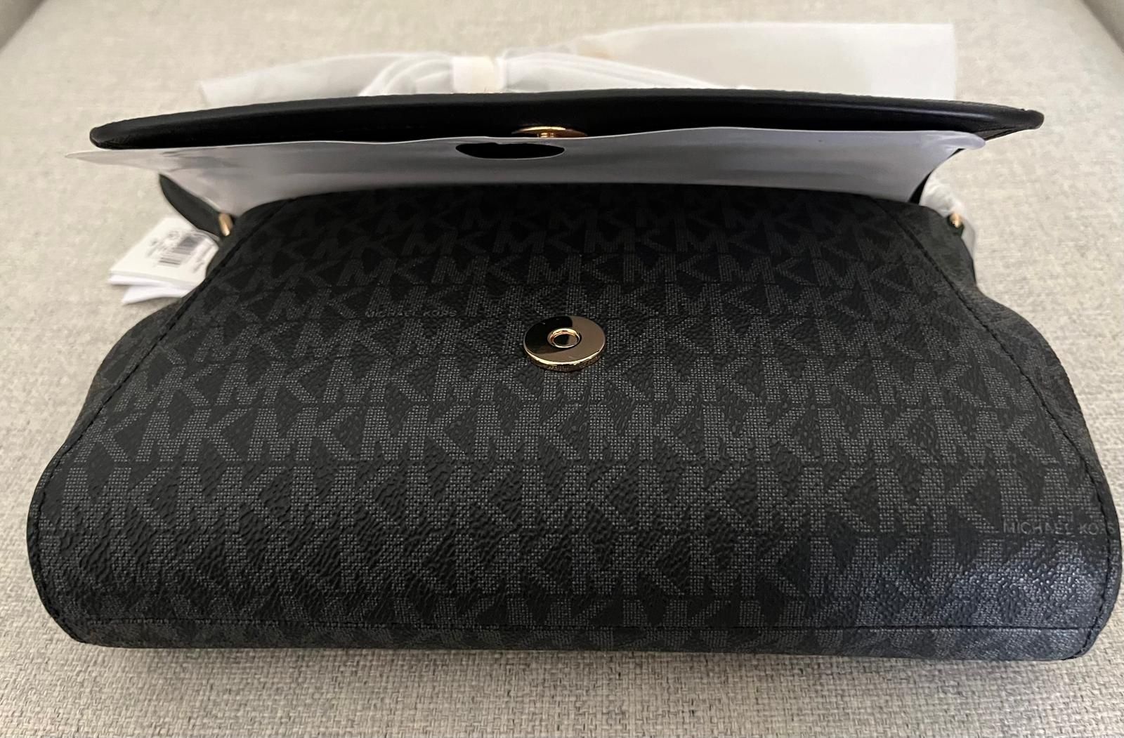 Bolsa preta Michael Kors que tiracolo (Jet Set)