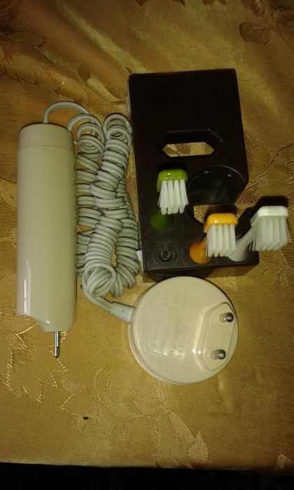 электрическая зубная щетка