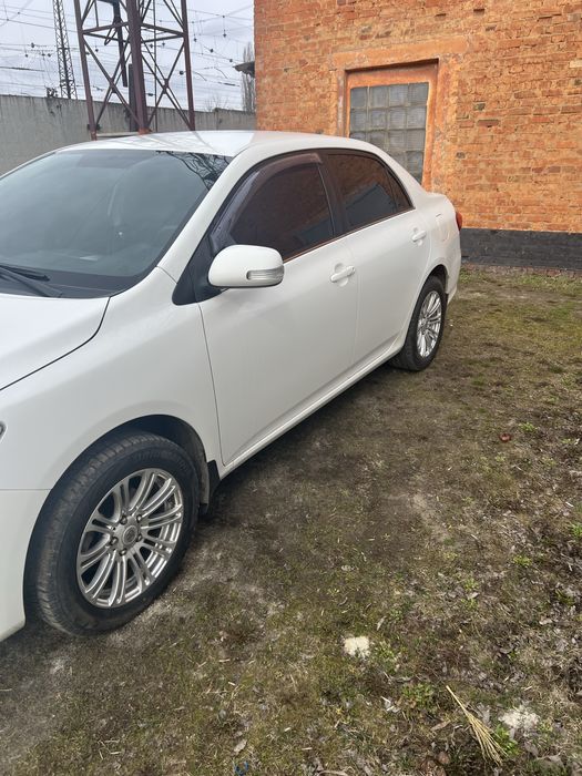 Тоyota corolla e 150