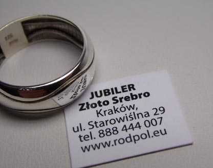 Srebrna pękata obrączka fale R.16. szerokość 7,5 mm.