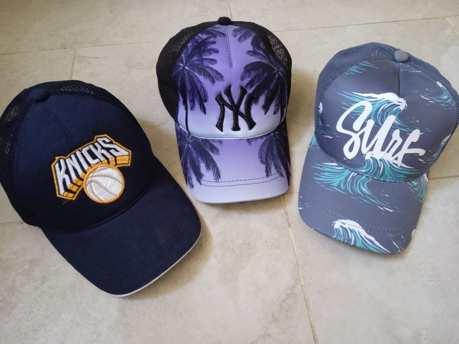 Кепки різні, нові, значна частина сітка ззаду