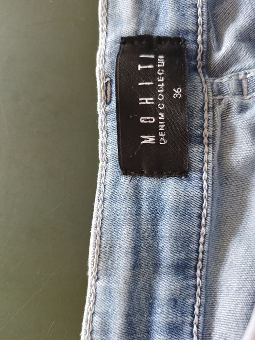 Jeansy dżinsy spodnie Mohito 36 z przetarciami