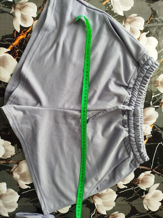 Костюм бузкового кольору