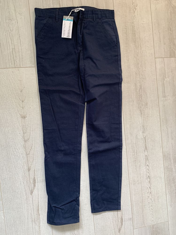 Nowe z metką spodnie jeansowe 158