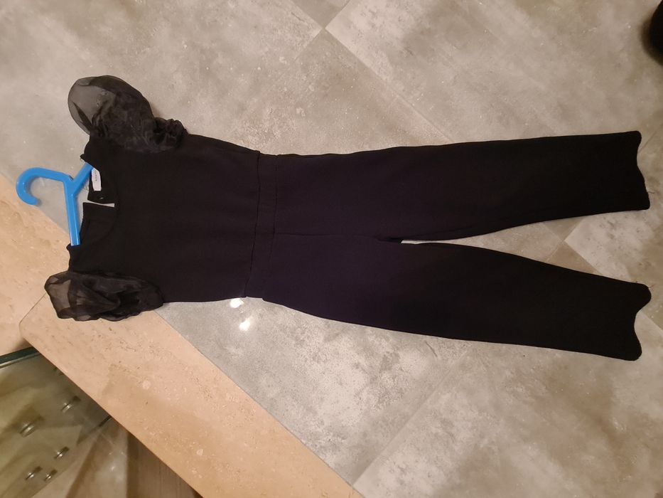 Kombinezon czarny Reserved jak nowy rozmiar 122