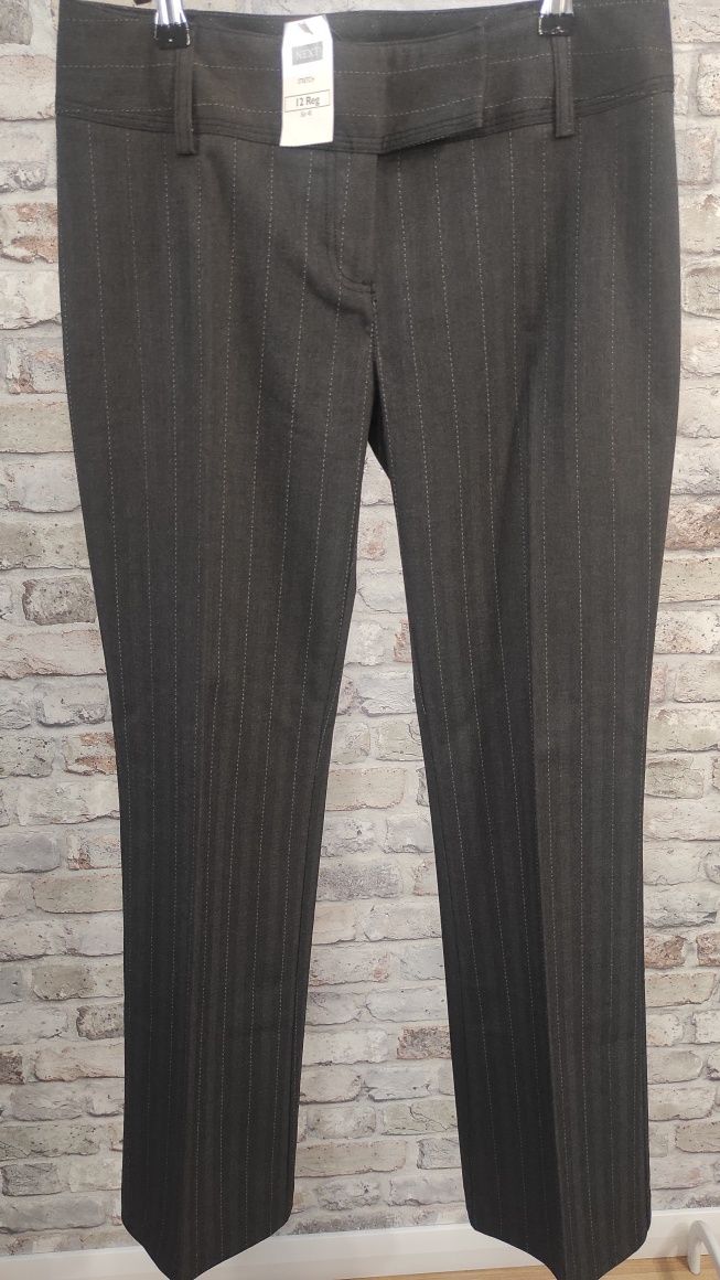 Nowe damskie eleganckie spodnie z kantem i z prostą nogawka