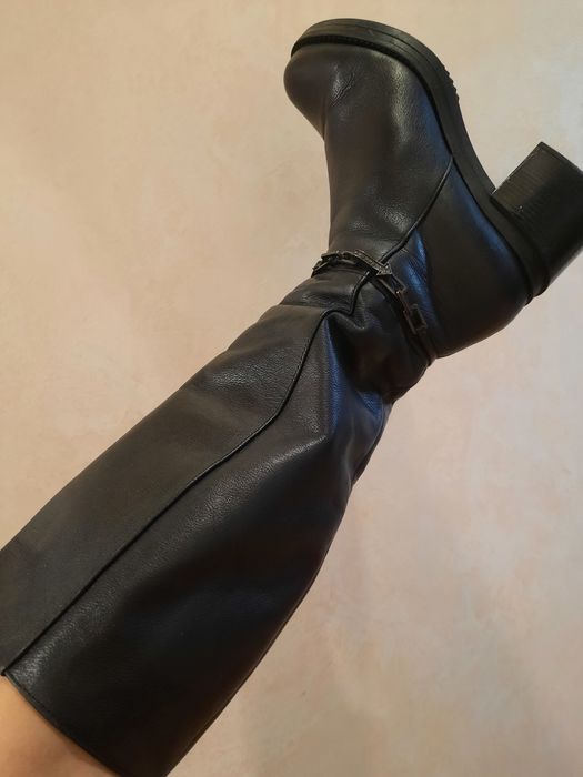 Шкіряні чоботи, високі