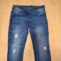 Jeansy damskie z przetarciami skinny M