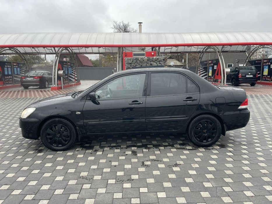 Mitsubishi Lancer 9 1.6 Газ Автомат
