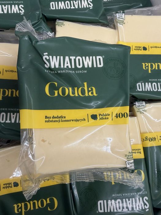 Сир Gouda , брусок , нарізка