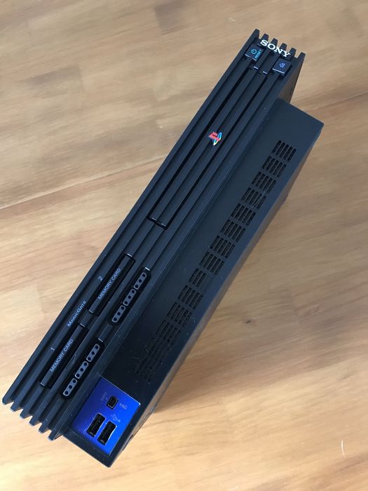 PS2 fat + comando + jogos