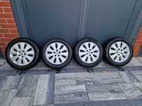 Felgi aluminiowe Opel 5x110 opony zimowe Continental 215/55r16
