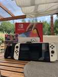 Nintendo Switch OLED biały zestaw gwarancja Mario kart + 2 etui