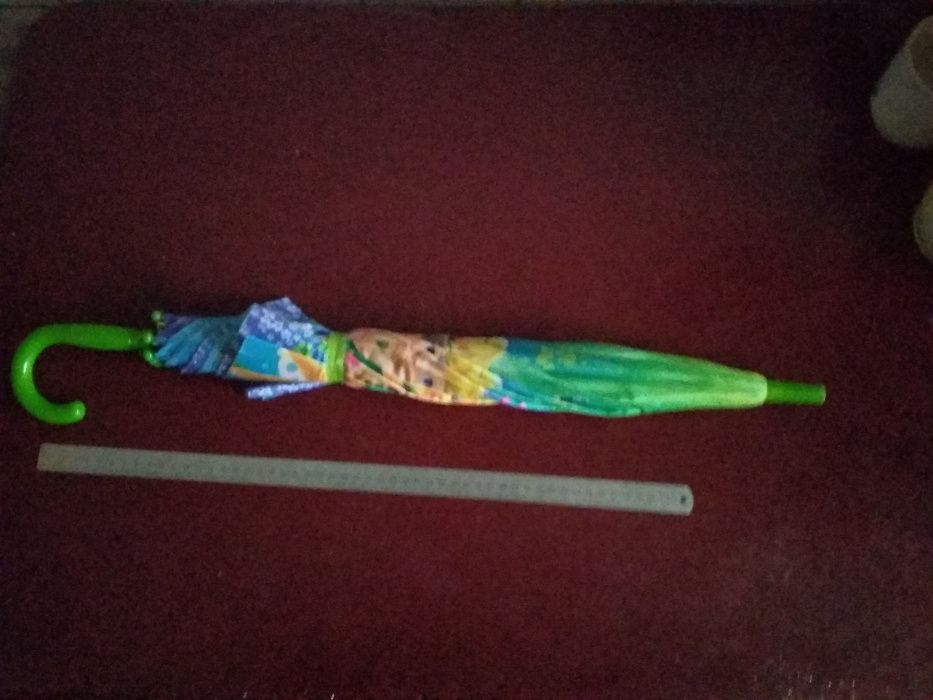 Продам игрушечную коляску и детский зонтик.