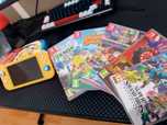 Nintendo Switch Lite amarela quase nova + 5 Jogos
