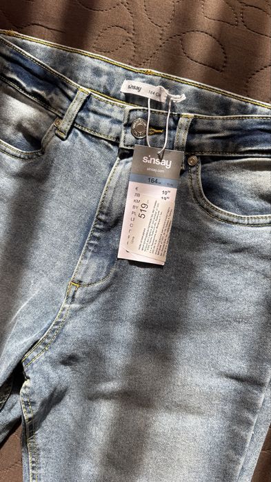 Нові джинси кльош Sinsay