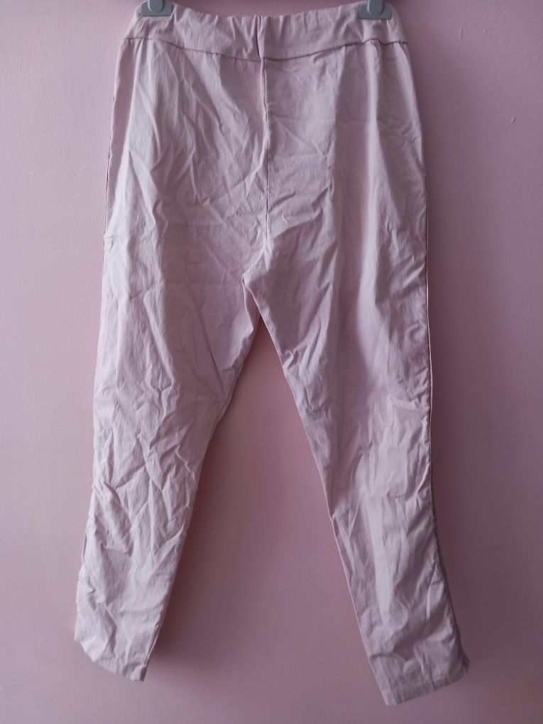 Spodnie pudrowy ruż z lampasami roz.L/xl gnieciuchy wymiary opis