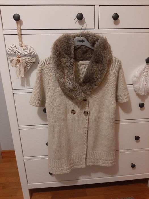 Casaco com pêlo na gola