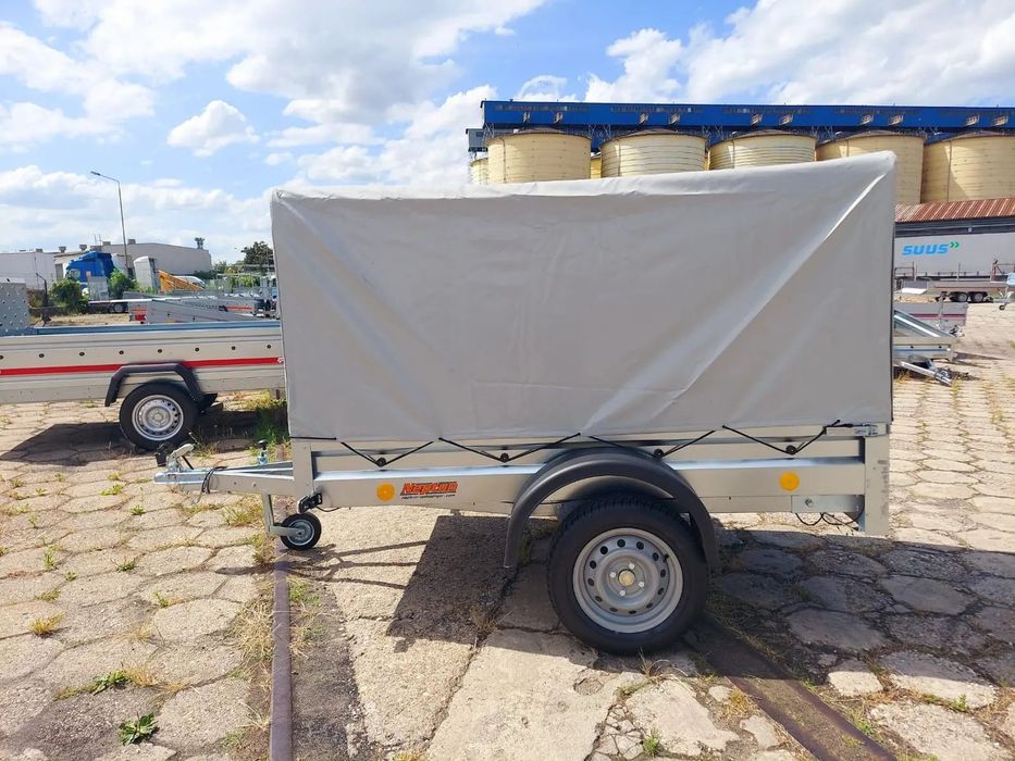 Neptun 202 PTS Zestaw  Nowa przyczepa samochodowa 202x125 cm + stelaż i plandeka 750kg Brzeg