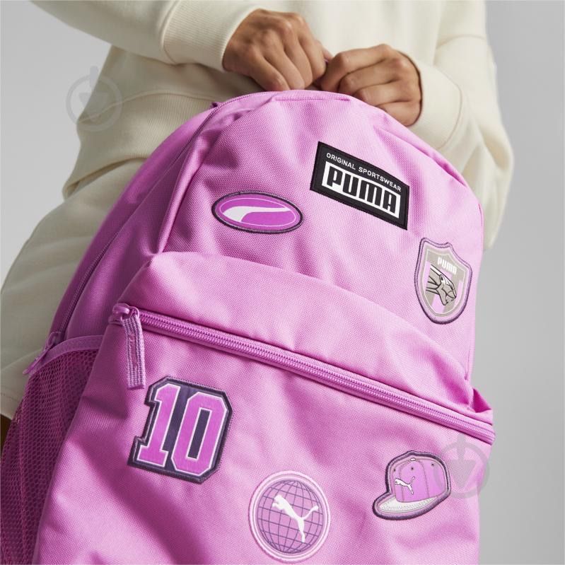 Рюкзак PUMA Patch розового цвета с нашивками.